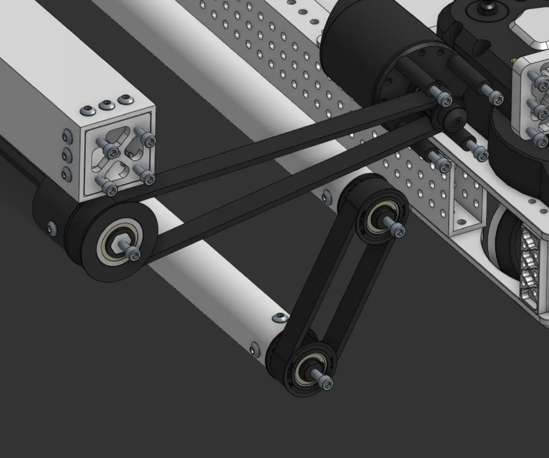 Idler gear coupling the two motors (left) and the belt runs to the rollers (right).