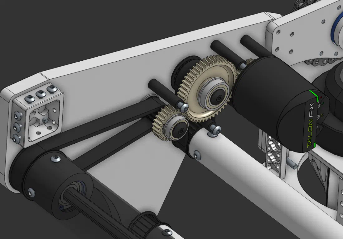 Idler gear coupling the two motors (left) and the belt runs to the rollers (right).
